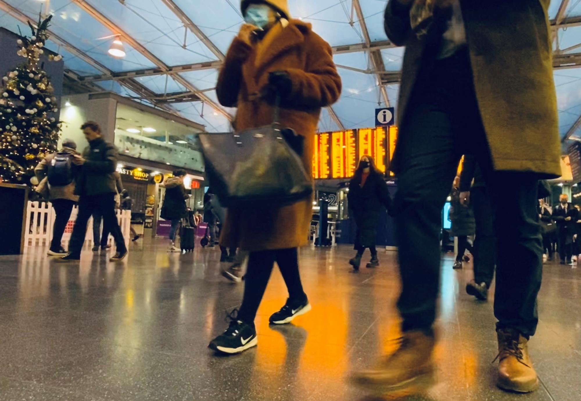 Passengers in a Railway Station