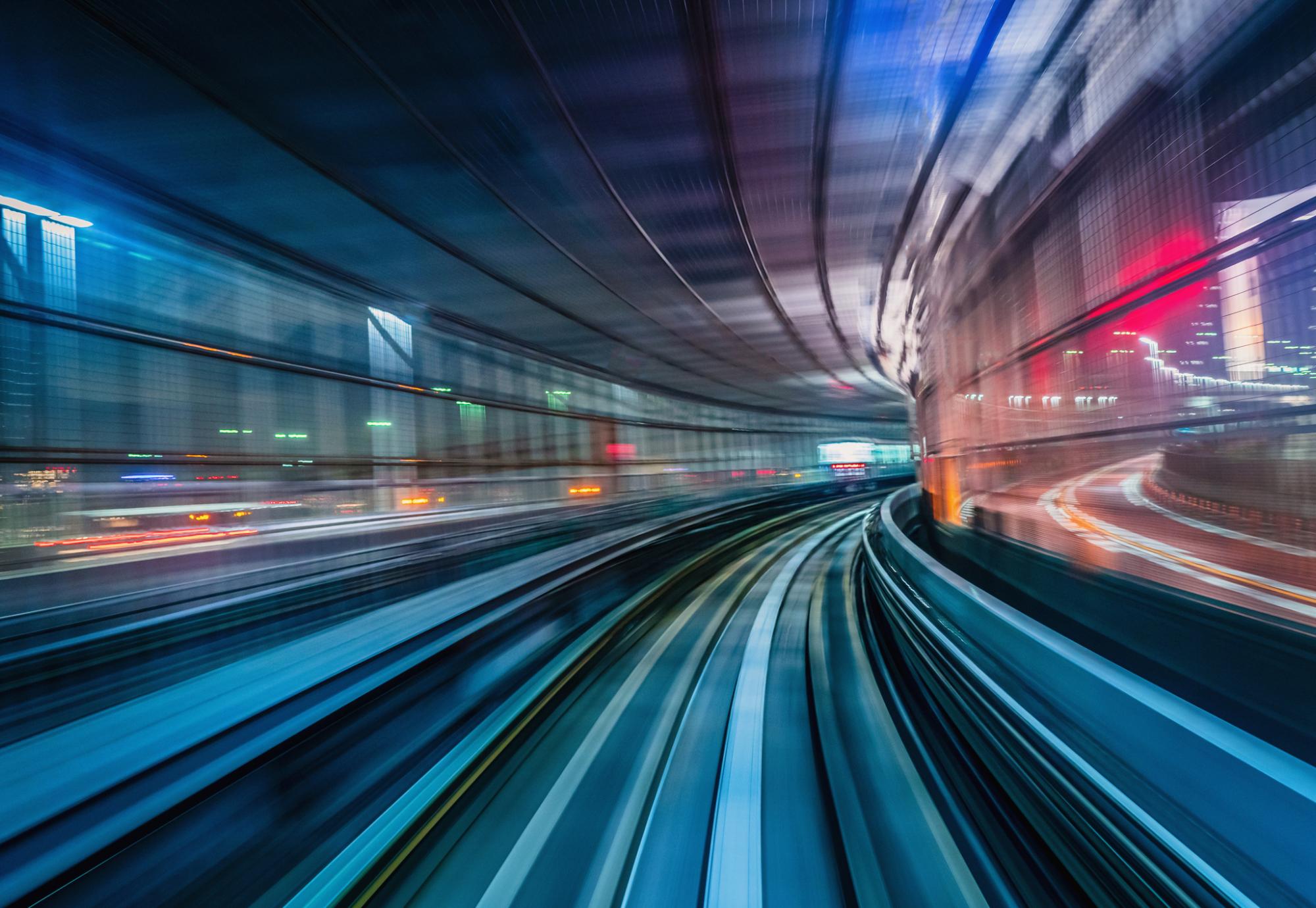 Fast train going through a station.