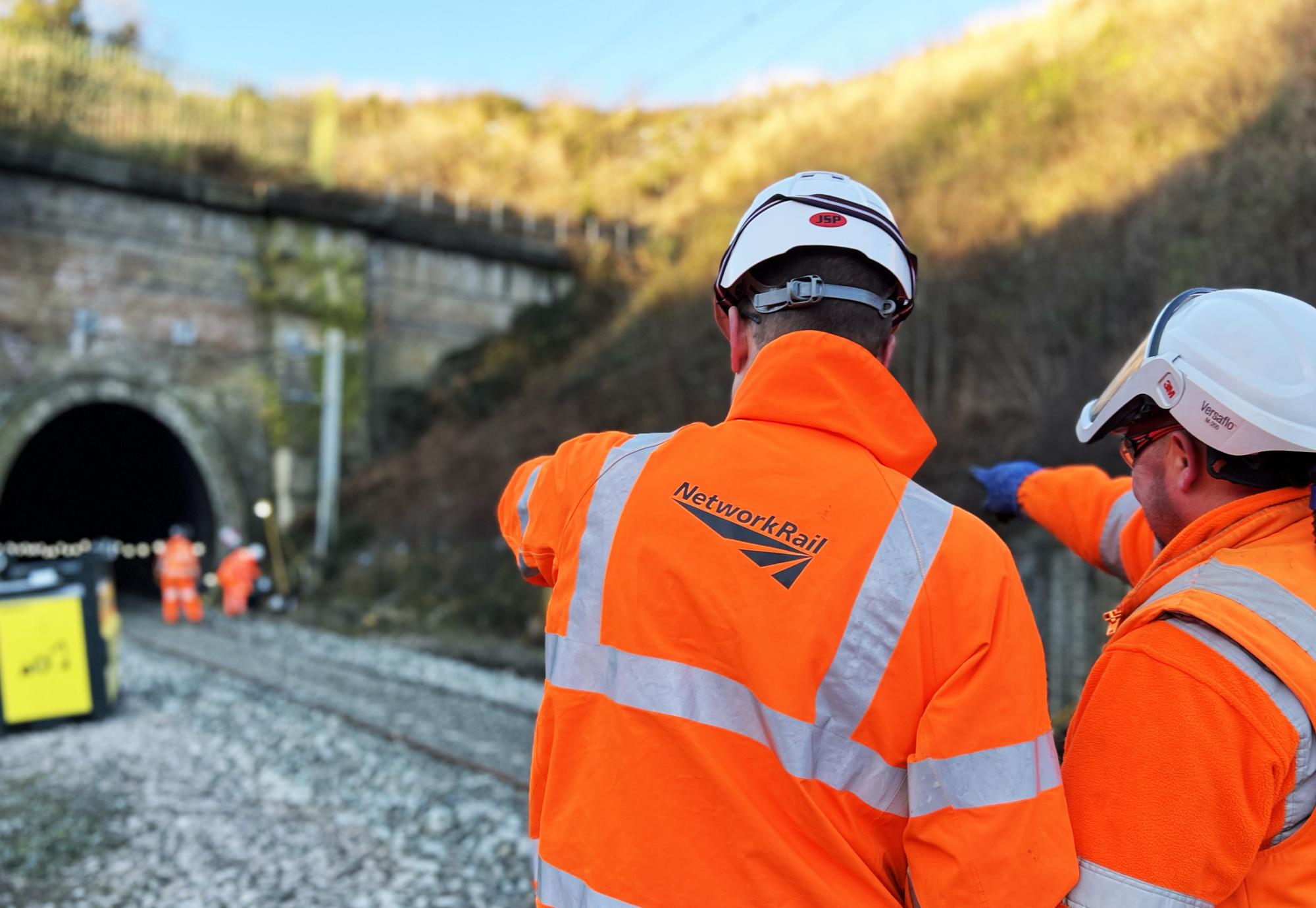 Engineers looking at tunnel