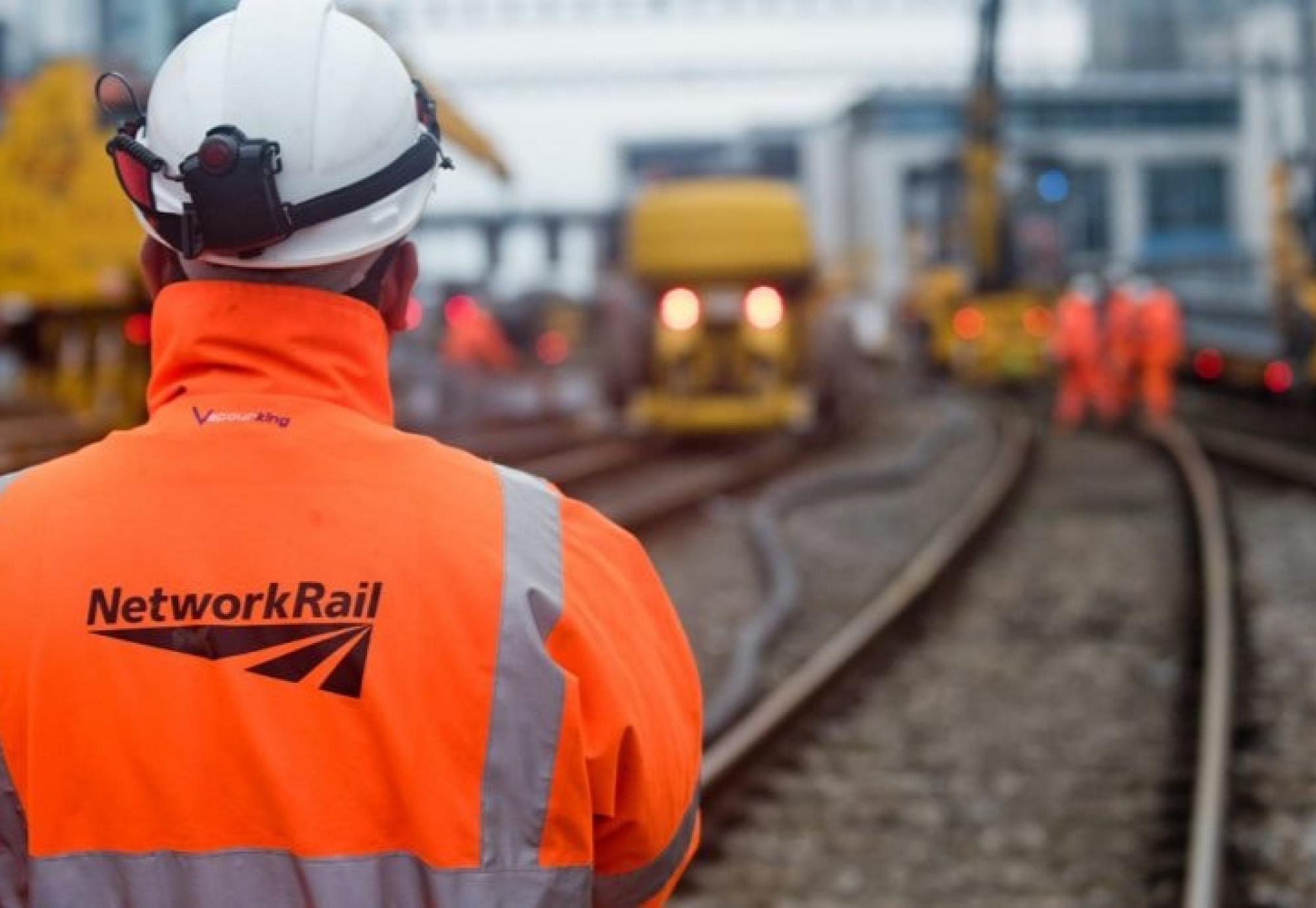 Network Rail Worker On Track