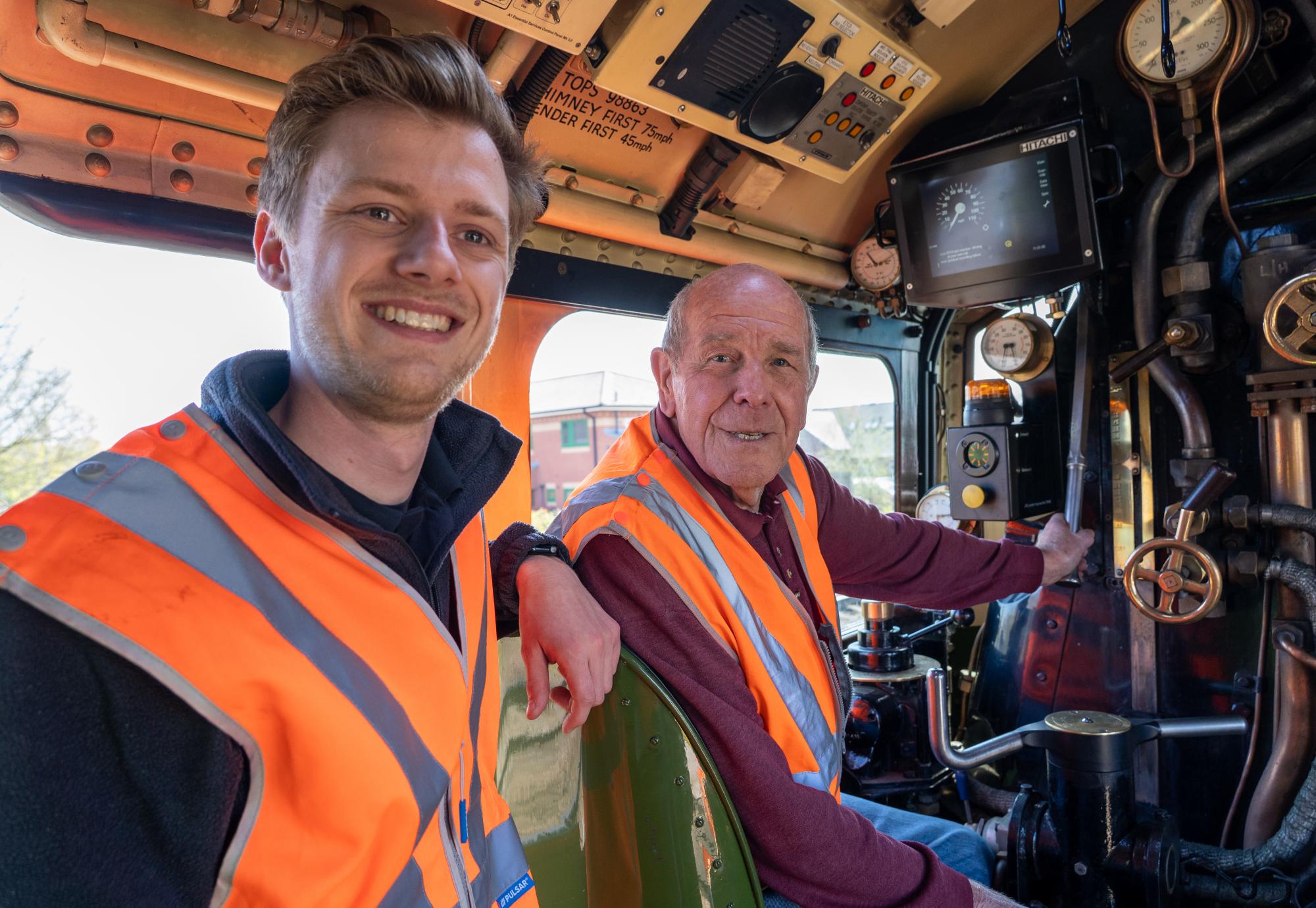 Team in Steam Train Cab