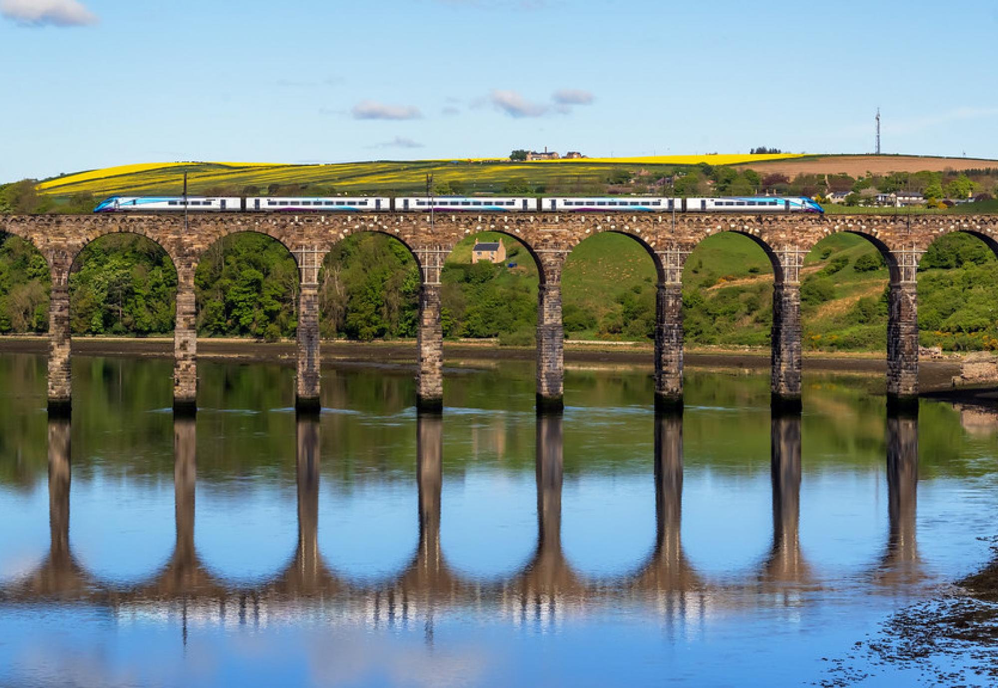 A TPE train on a viaduct