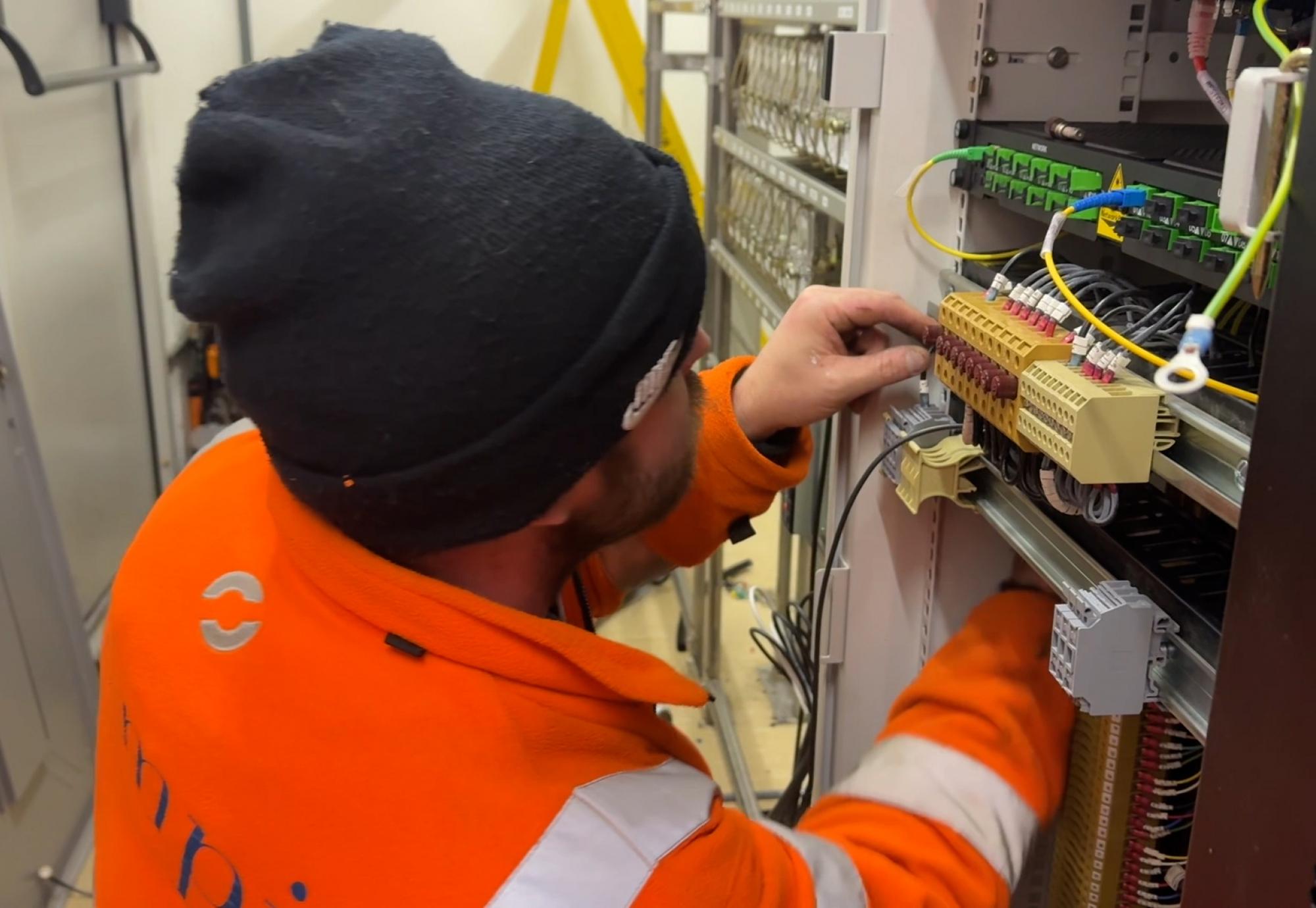 Engineering wiring up new signalling system