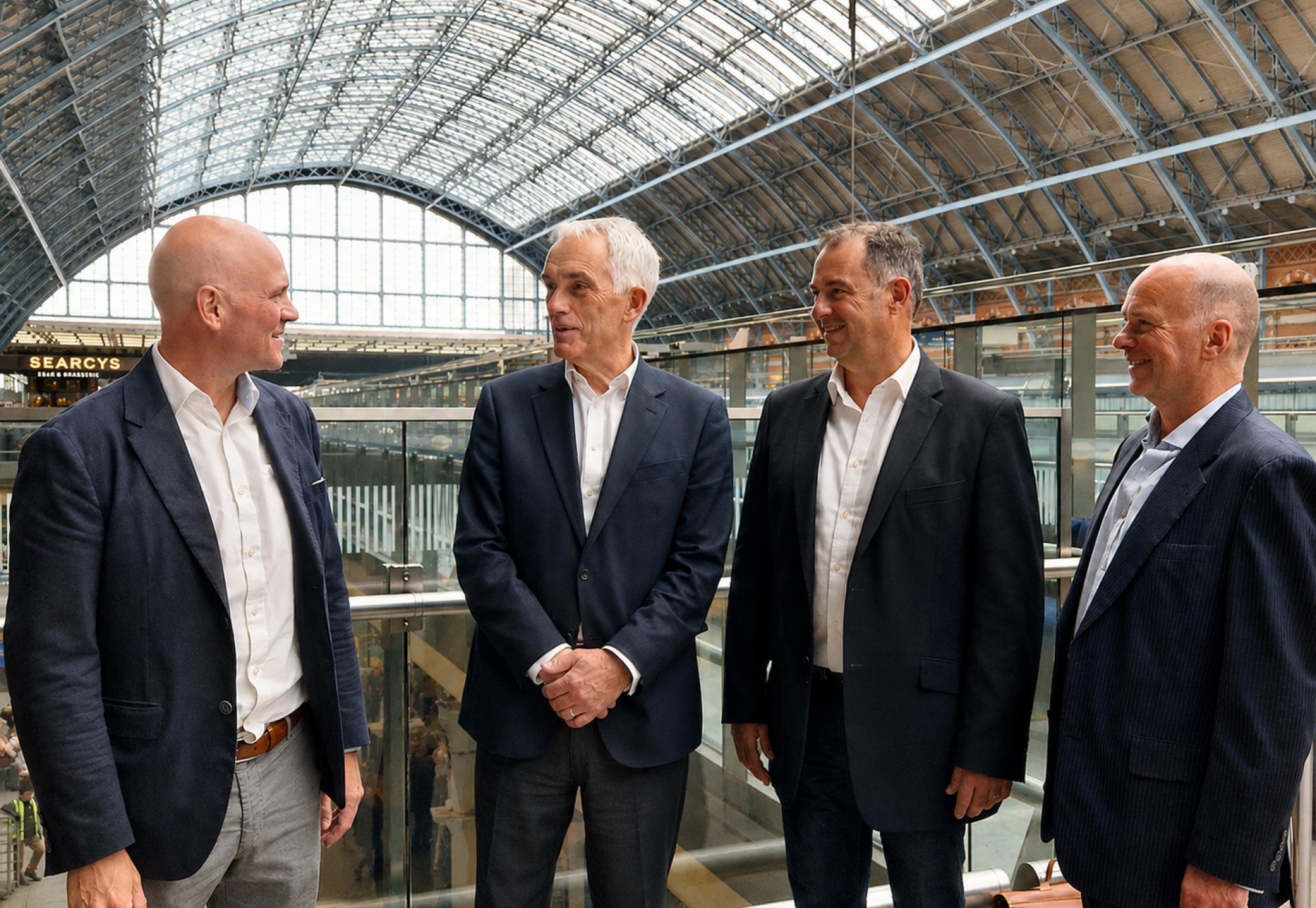 four men on gantry