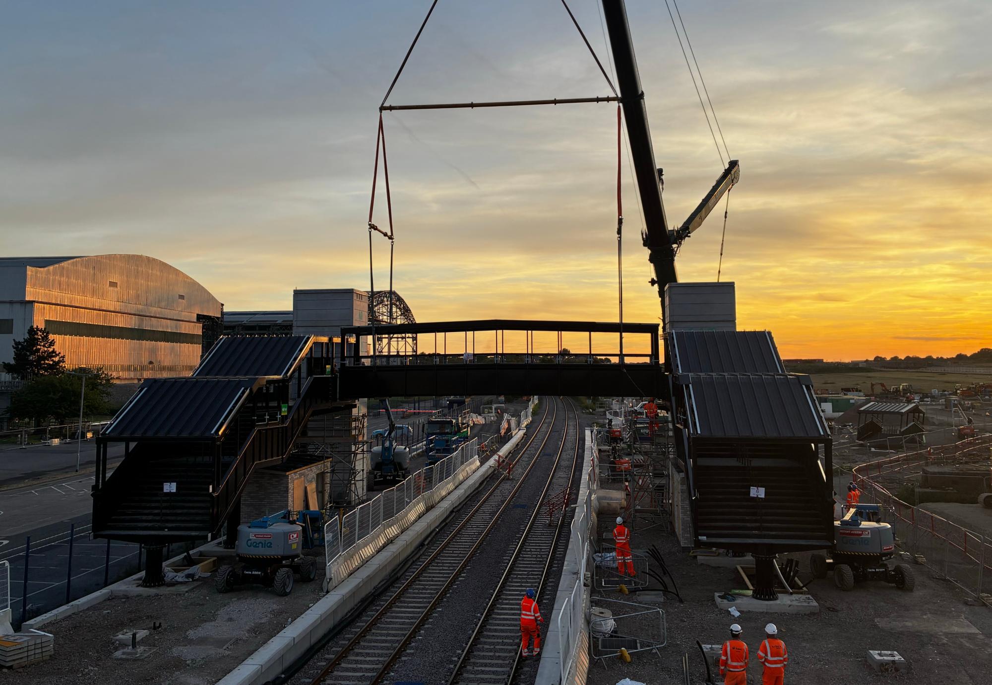 Lifting the footbridge into place