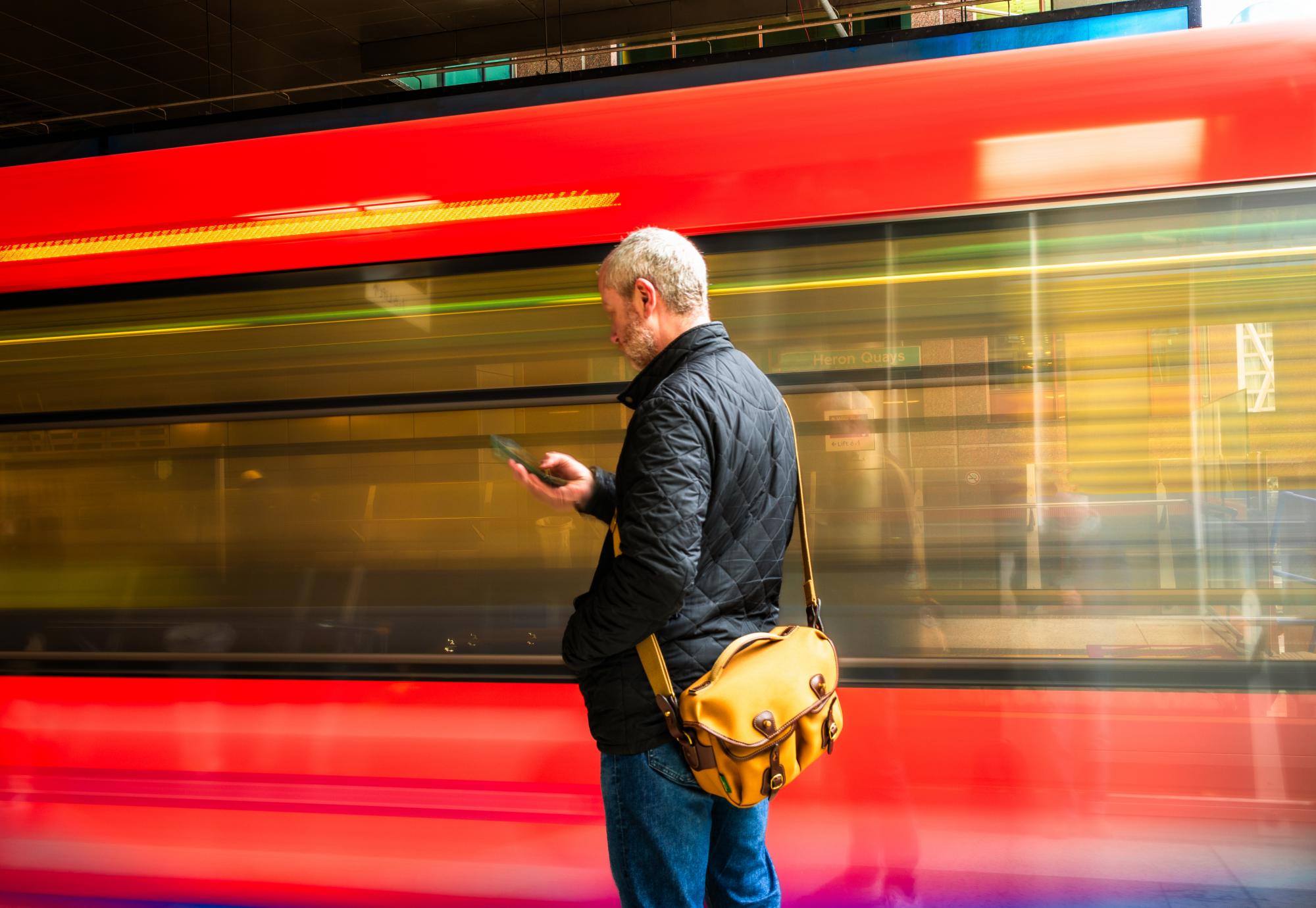 Man near a fast train