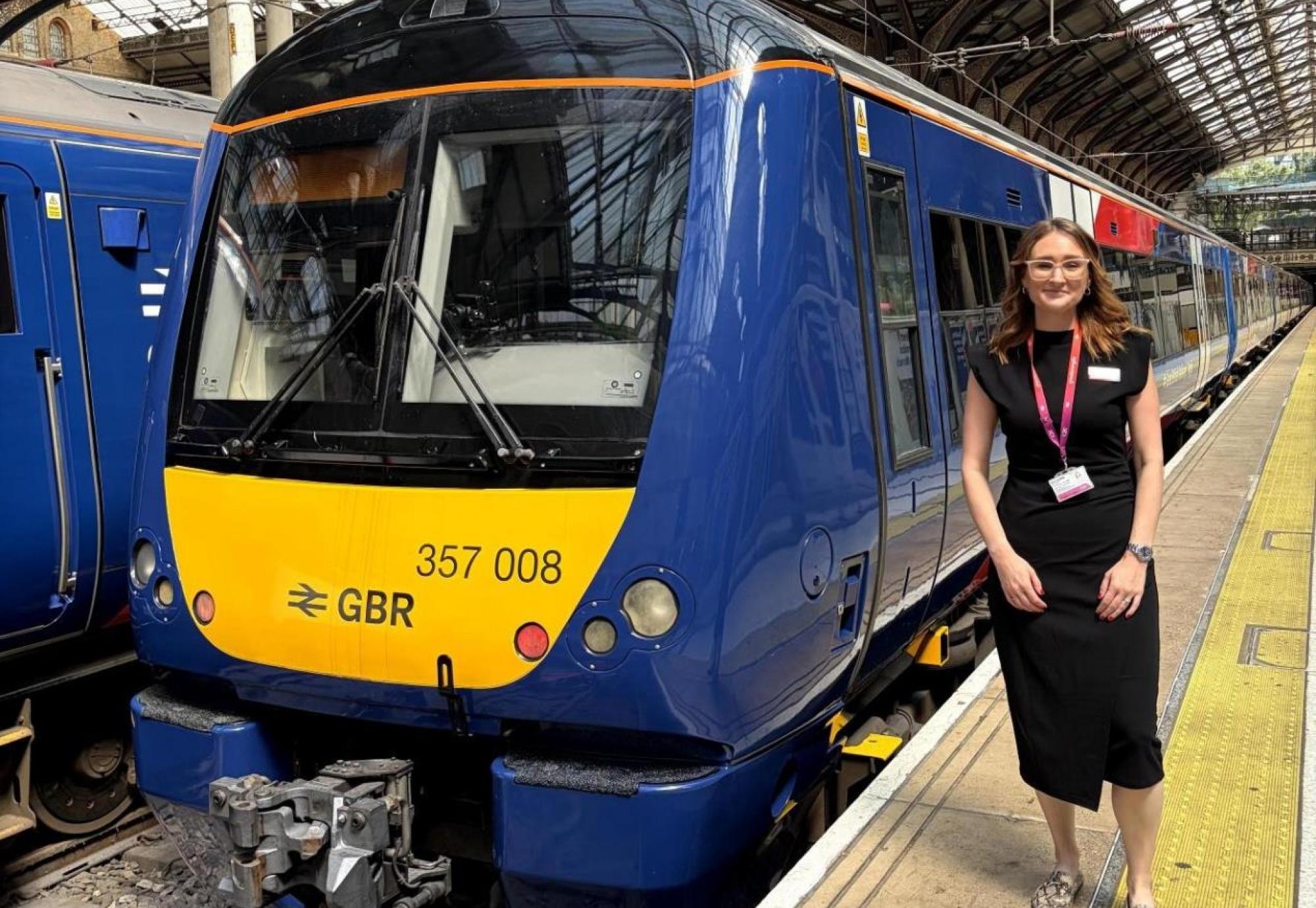 Alice Shimali and a train