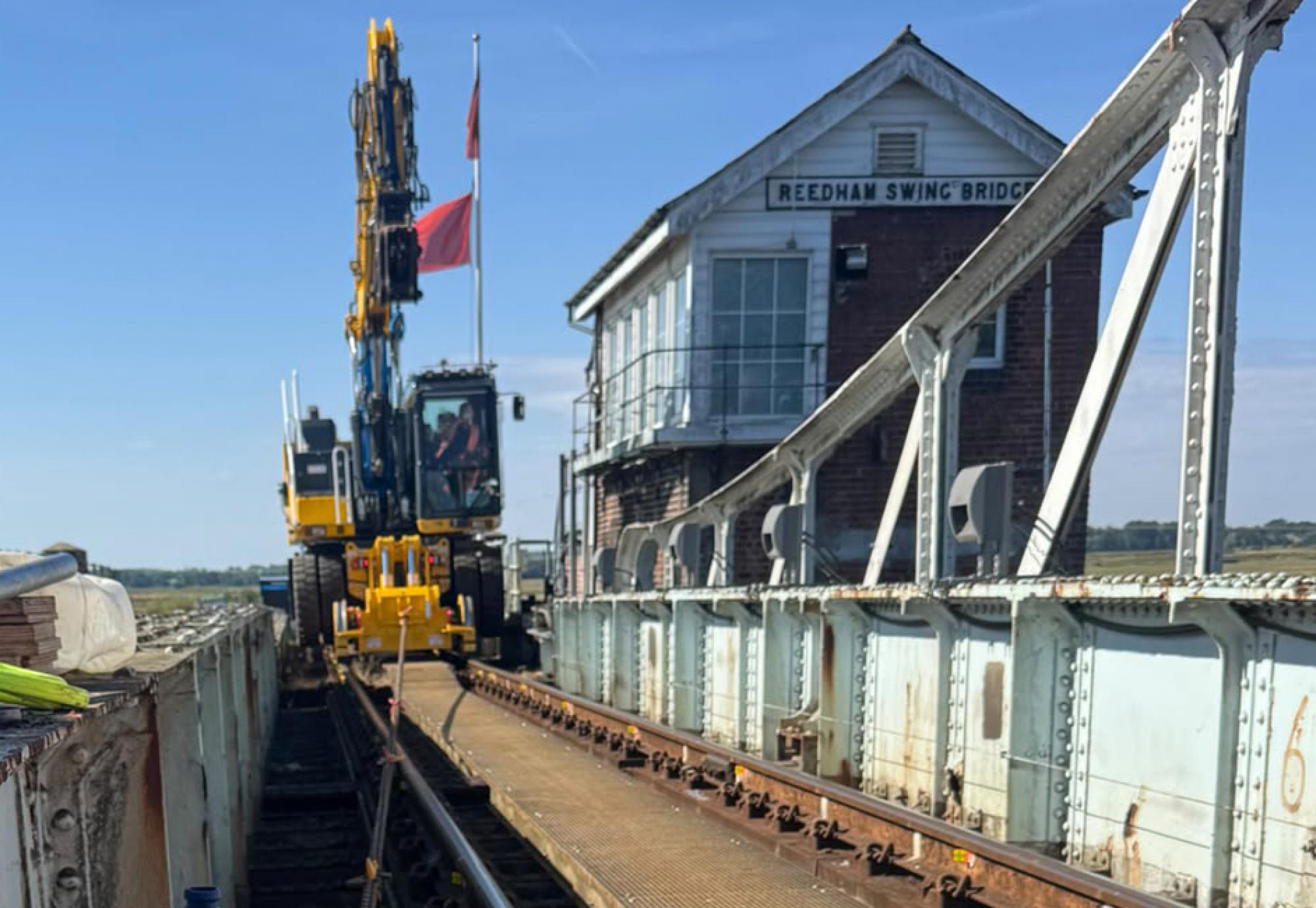 A road rail vehicle working on the bridge