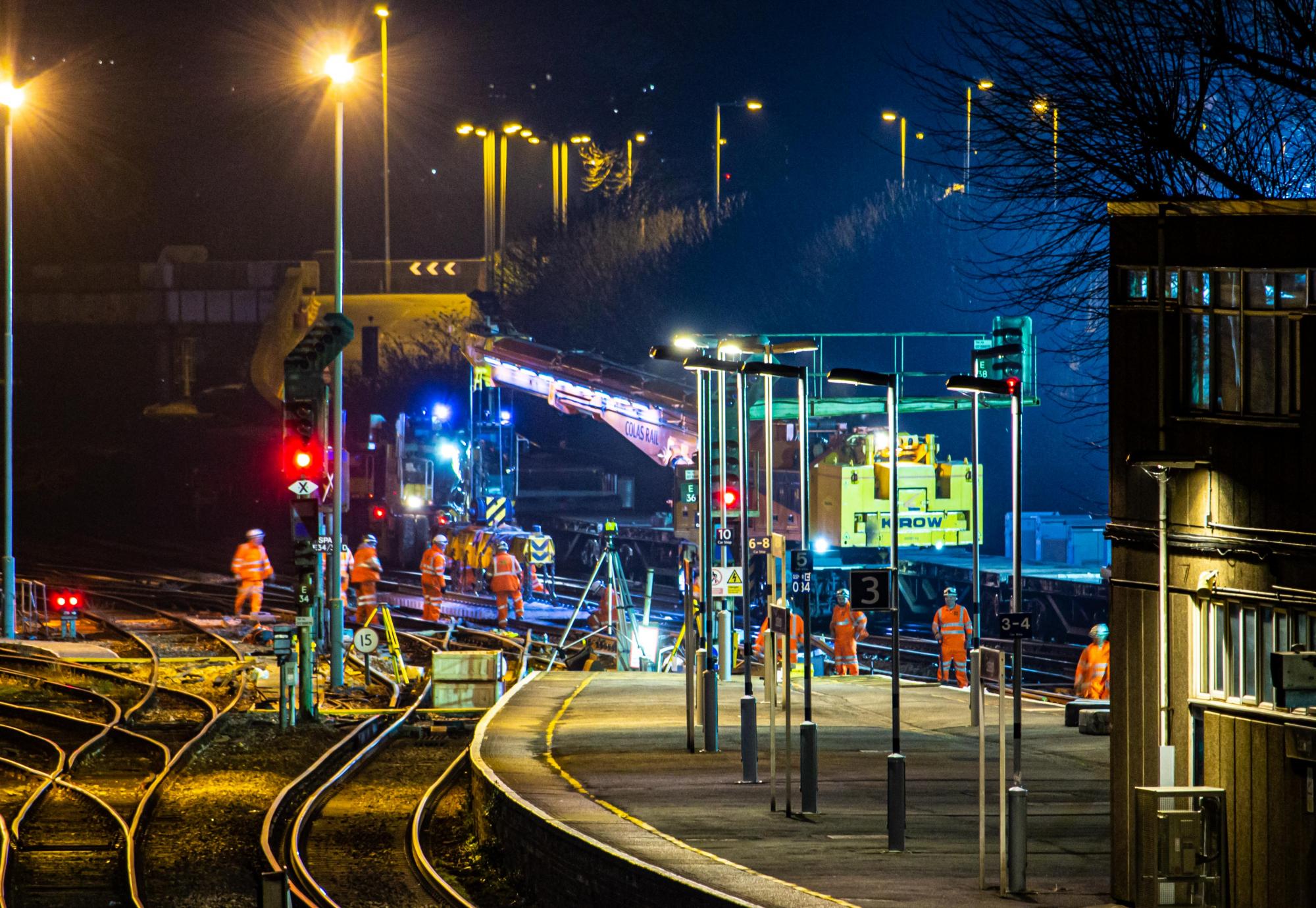 Rail workers at night