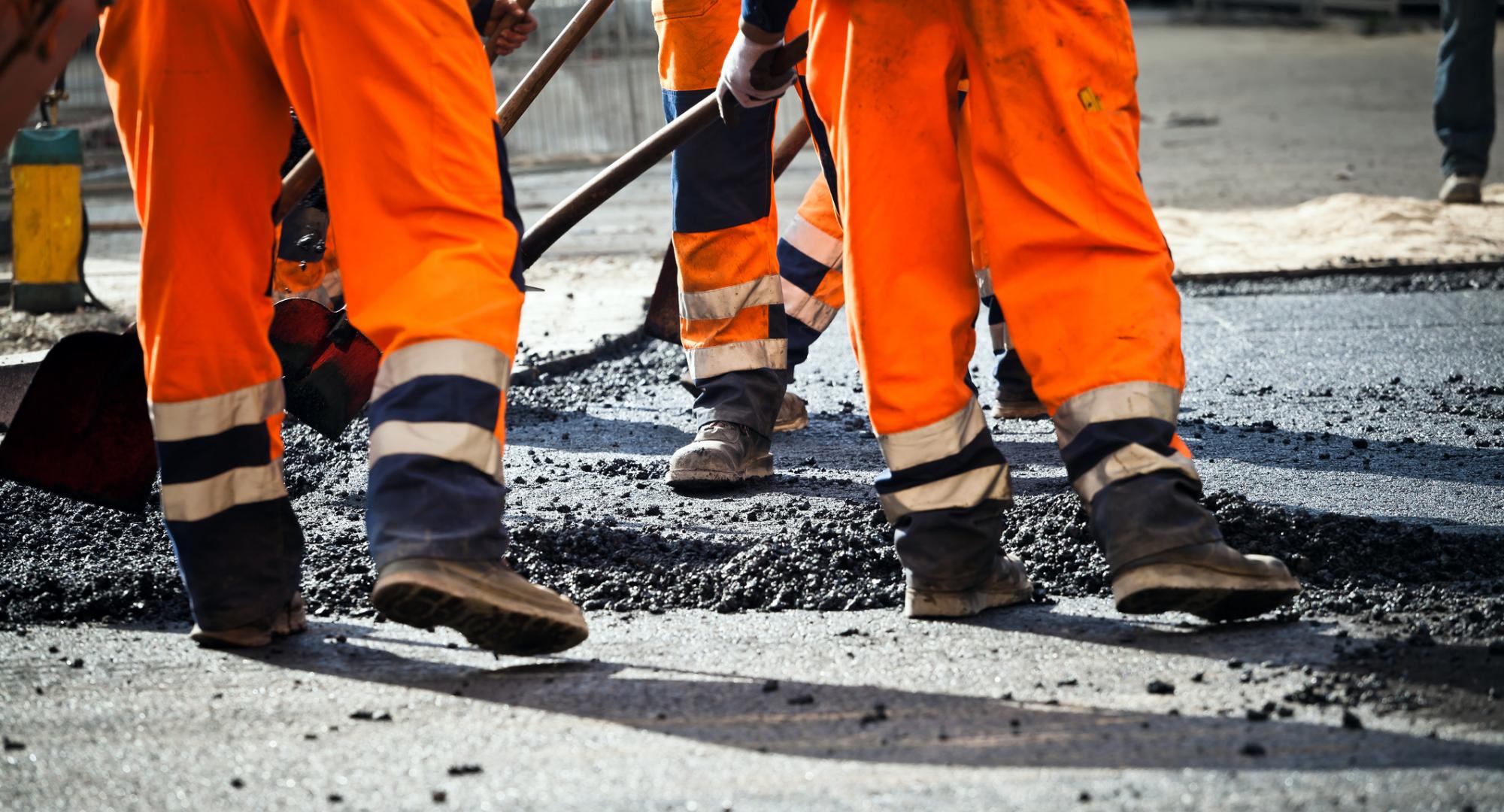 Generic picture of transport workers in high visibility clothing