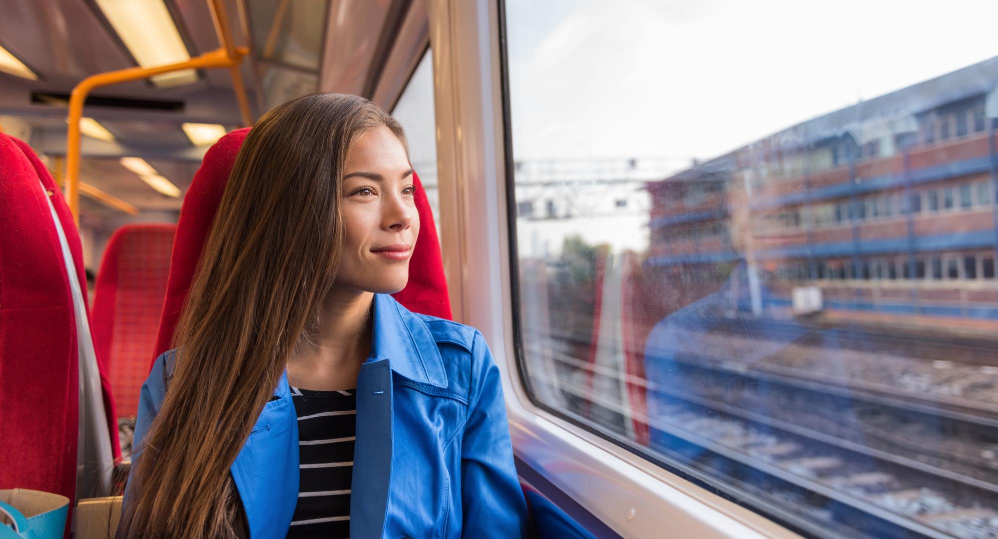 Female passenger riding on a train