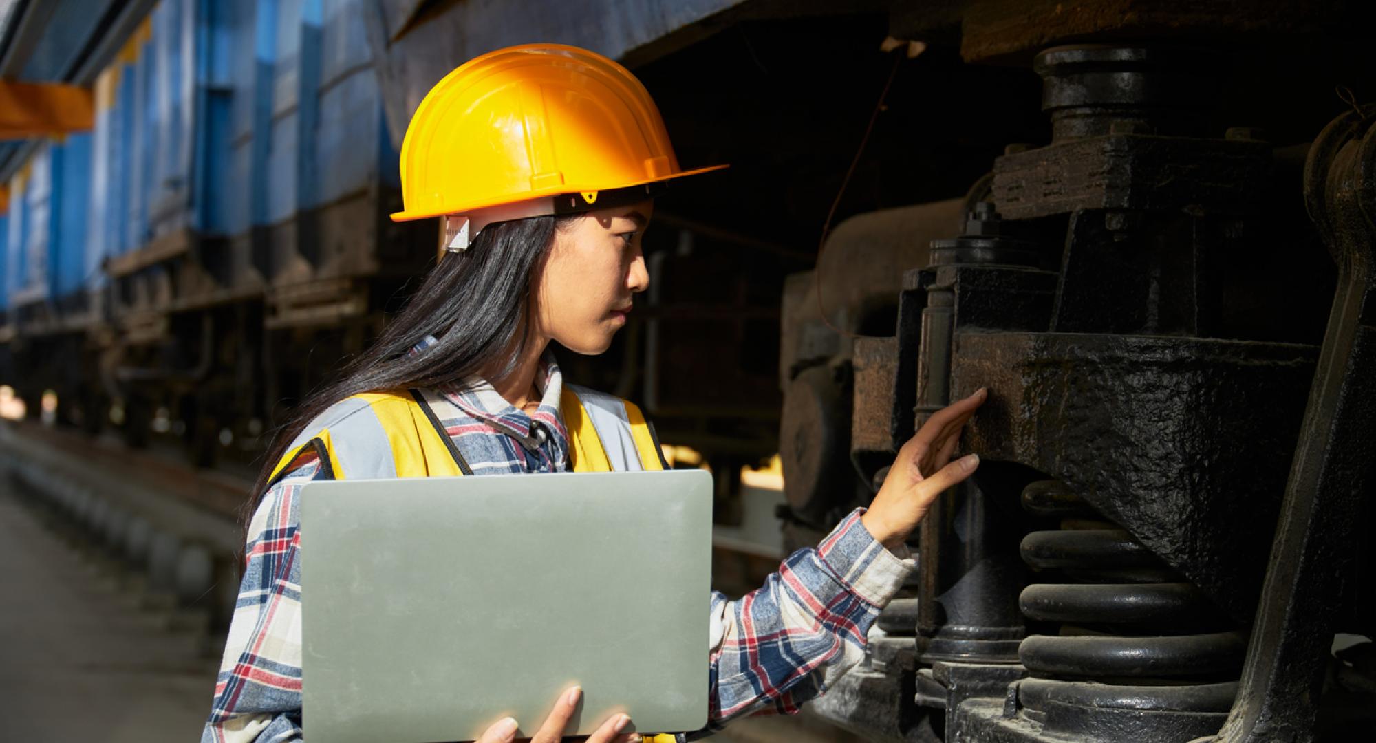 Female engineer working on train