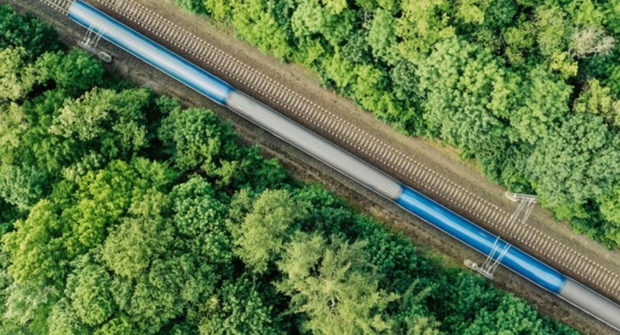 Train travels down tracks