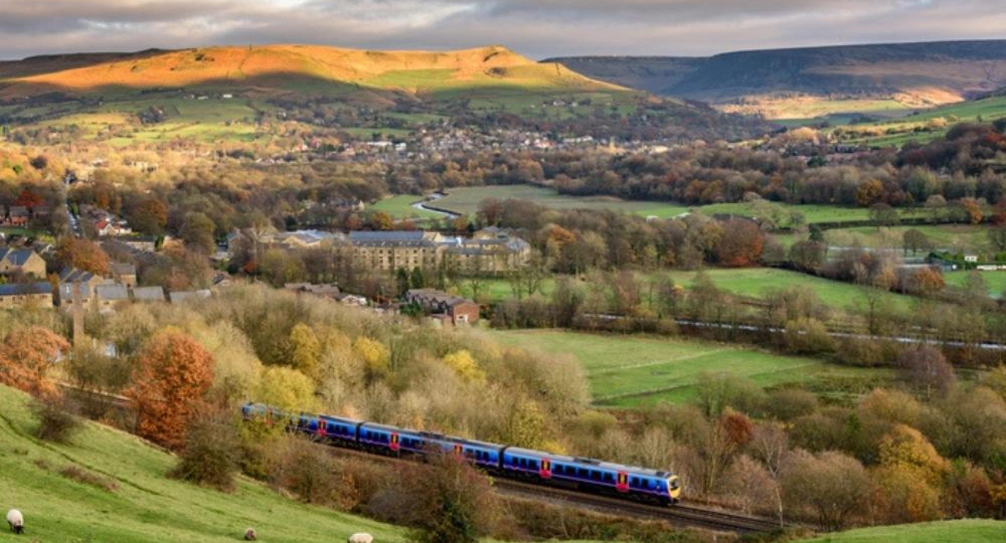 Train travels down tracks