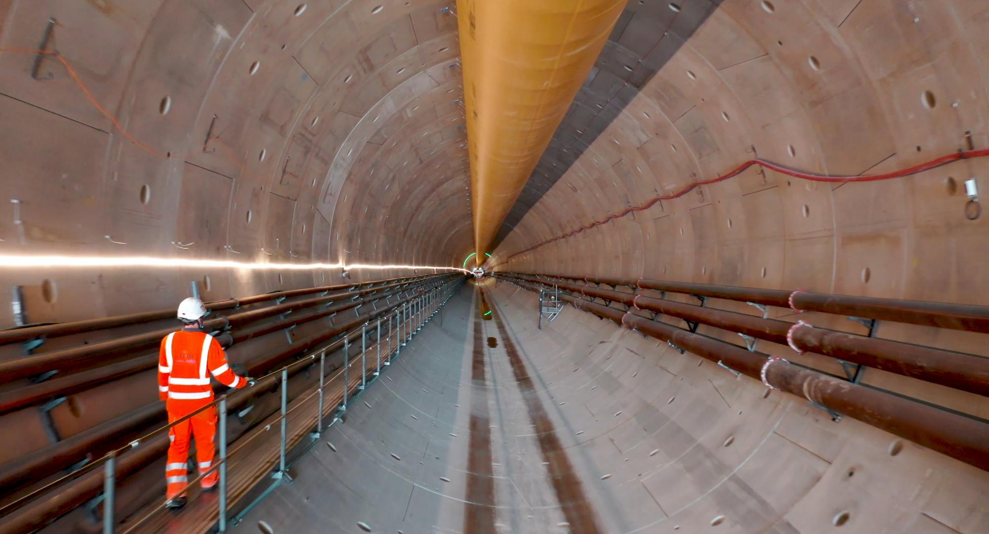 Worker walking down the Chiltern tunnel