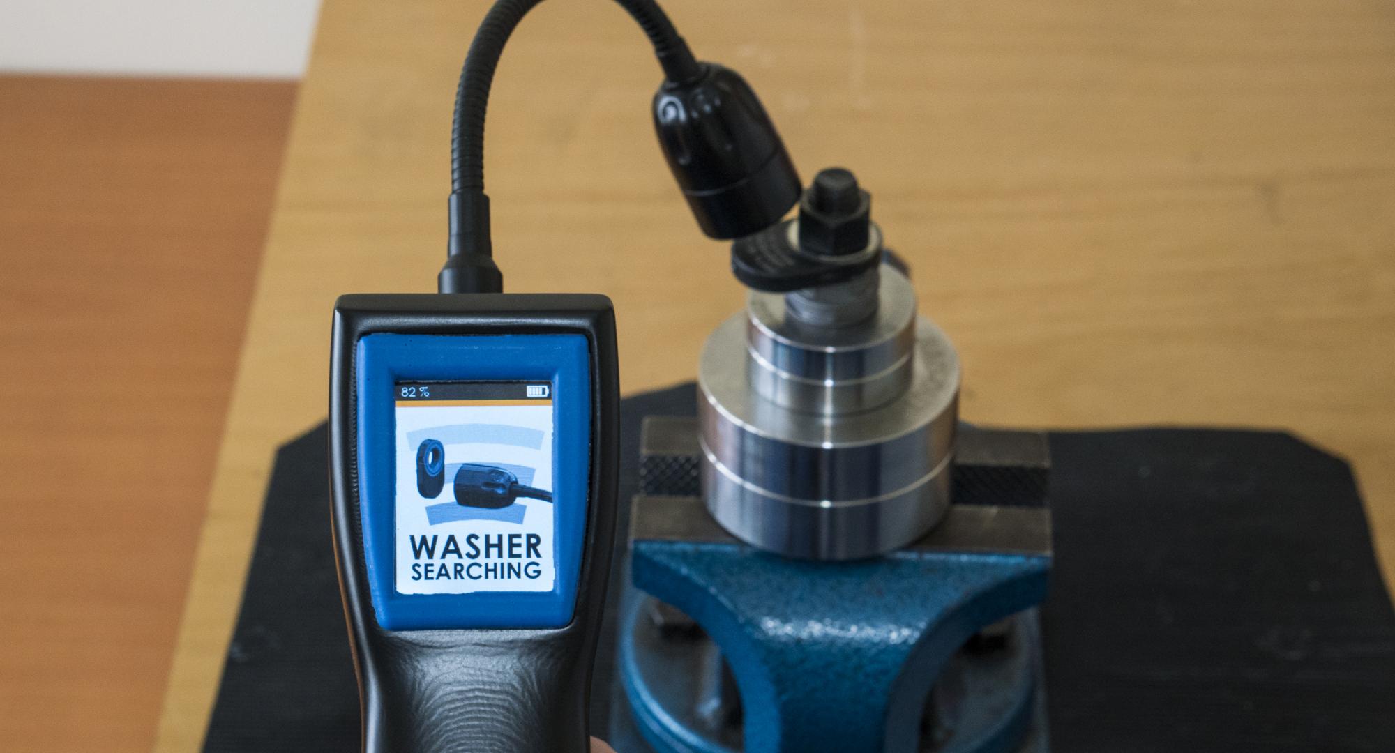 Smart washer enables touchless and wireless measurement of bolt axial load 