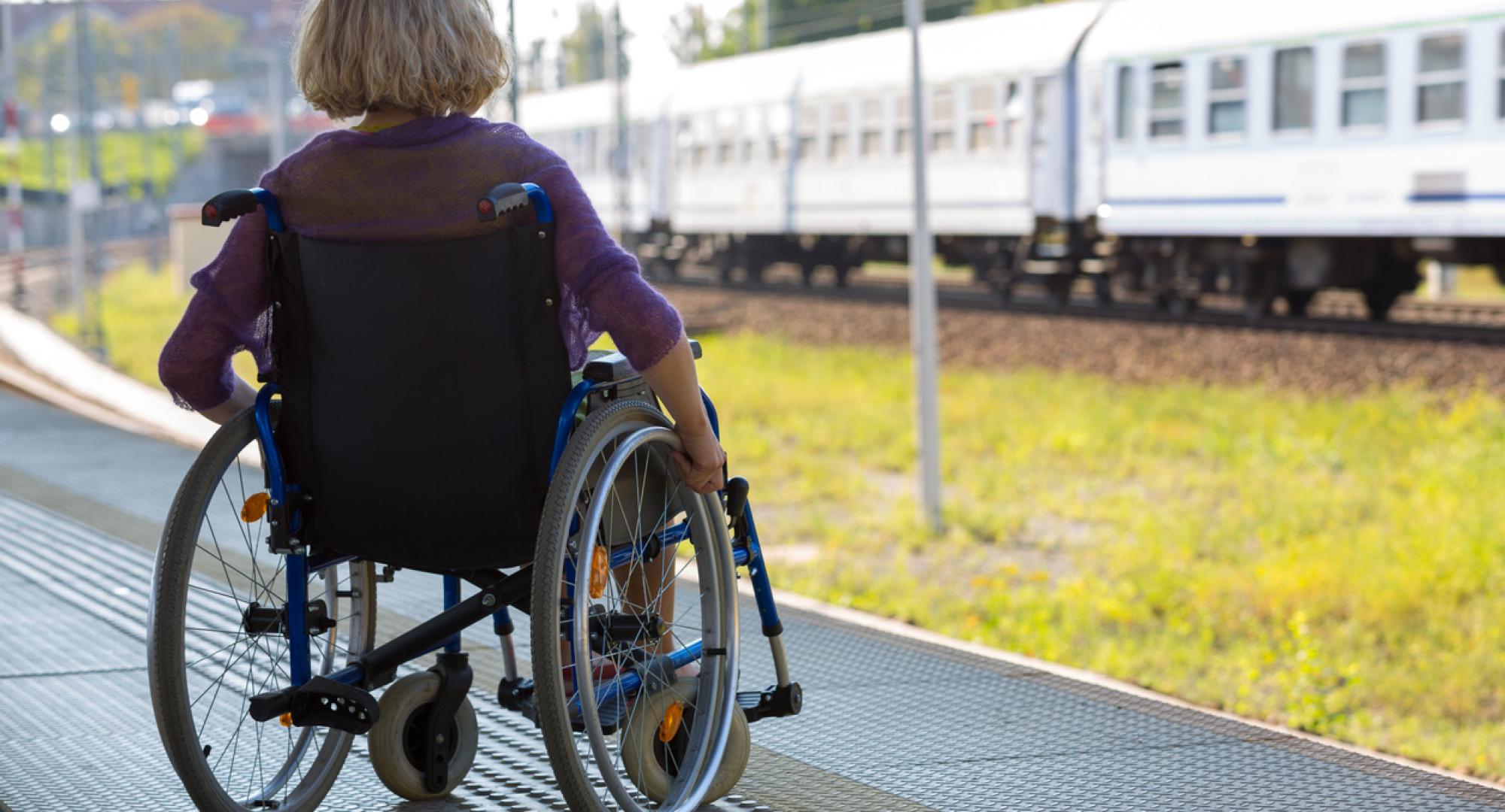 Female rail user in wheelchair