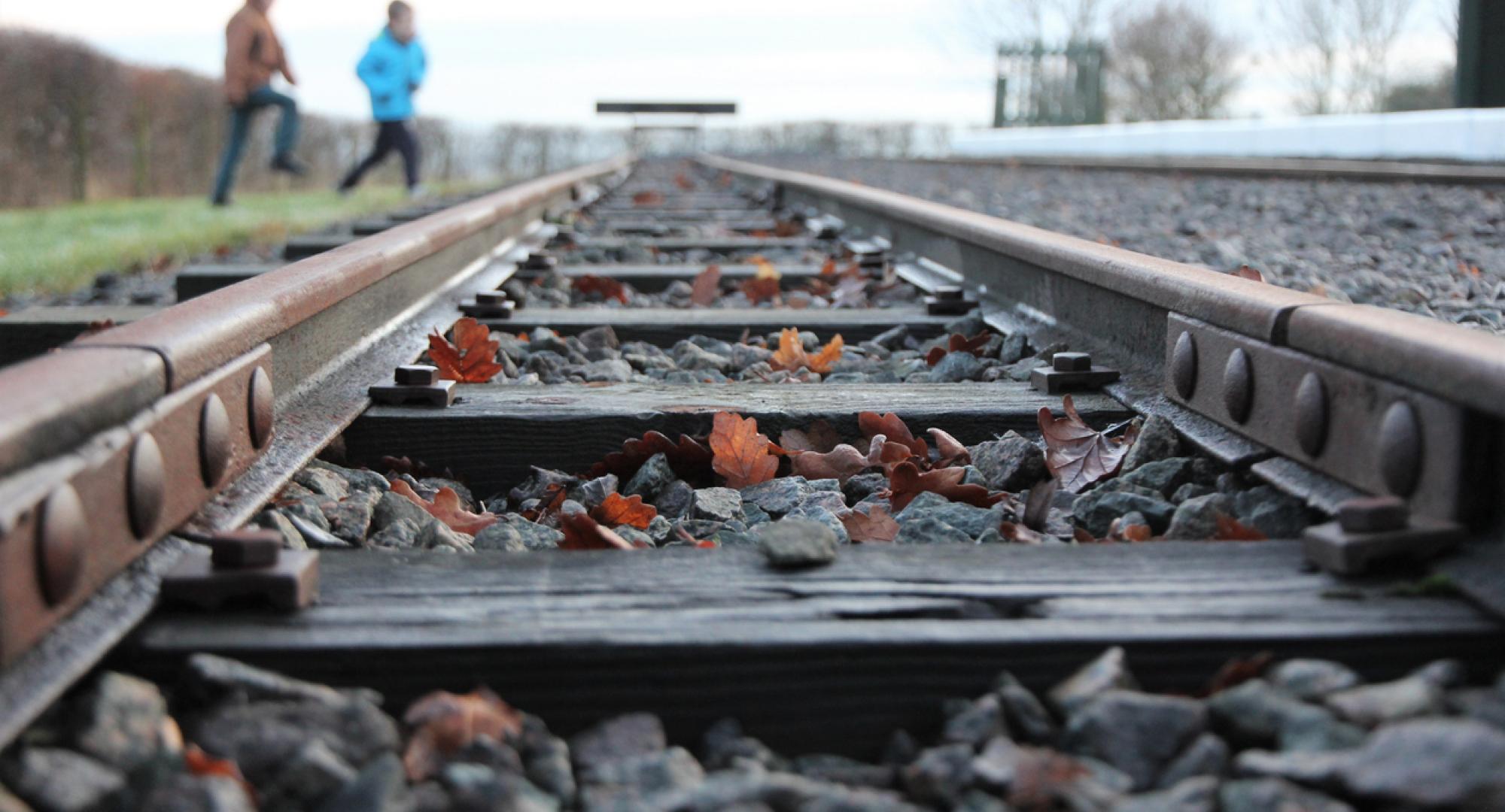 Young children near railway lines