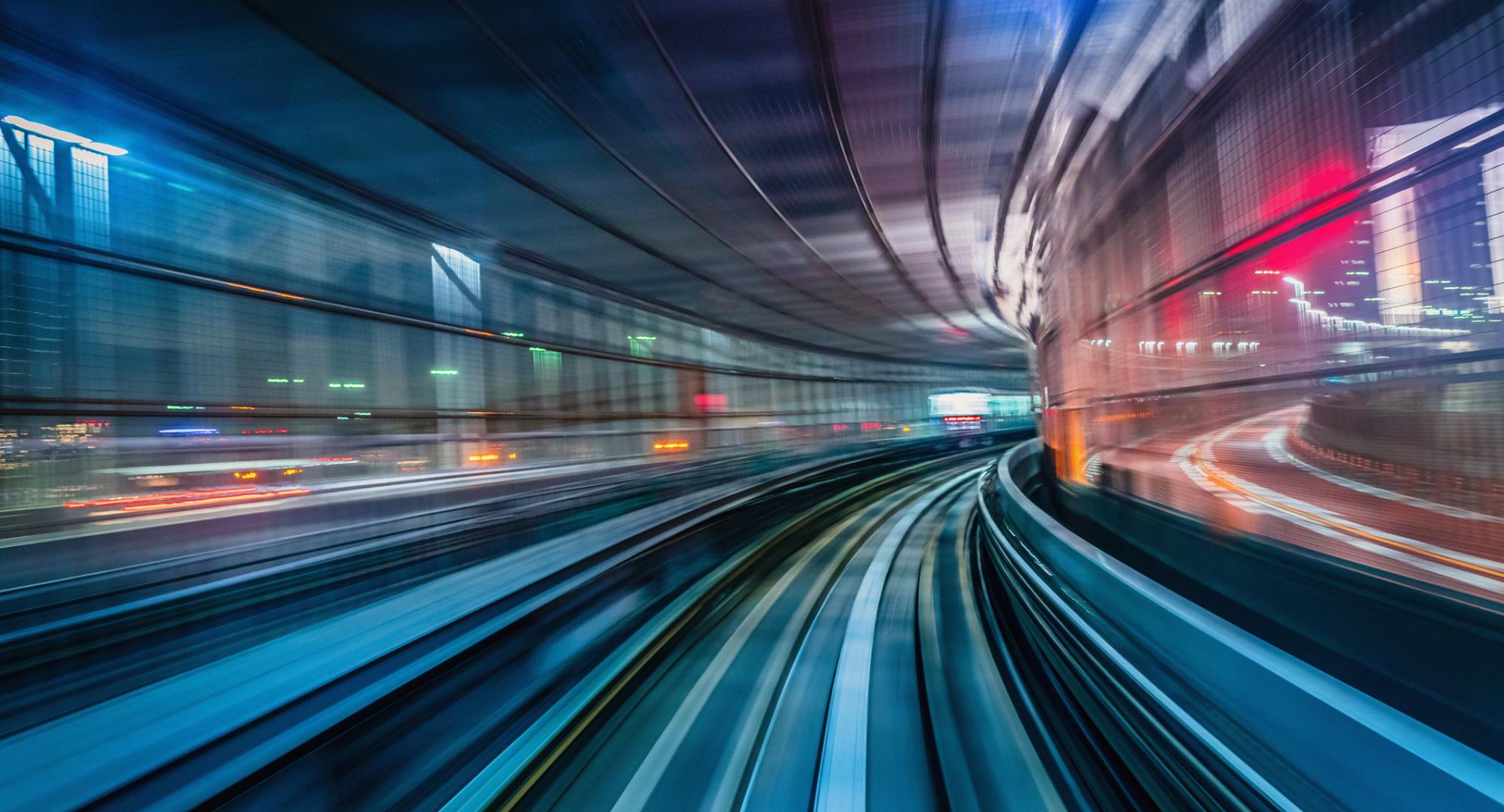 Fast train going through a station.