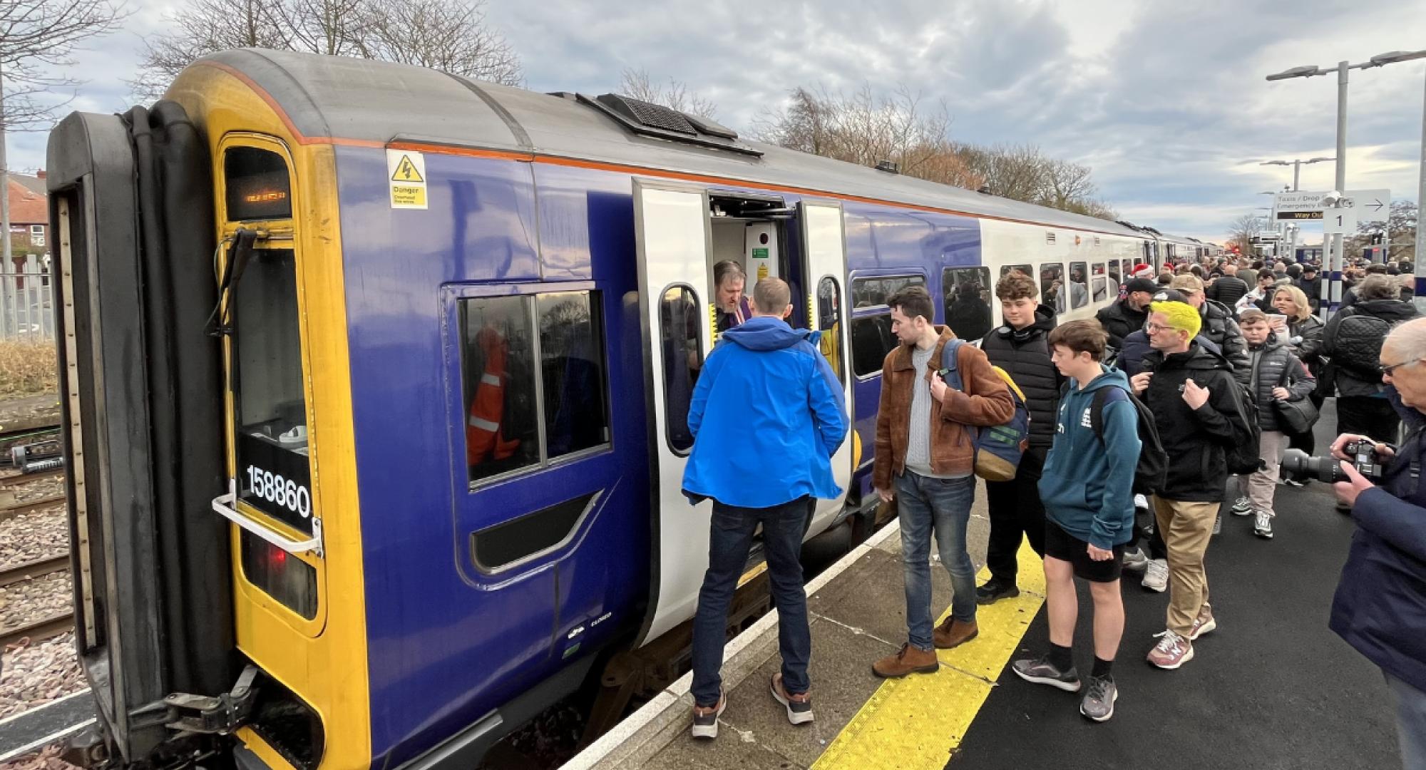 Passengers boarding a train in Northumberland