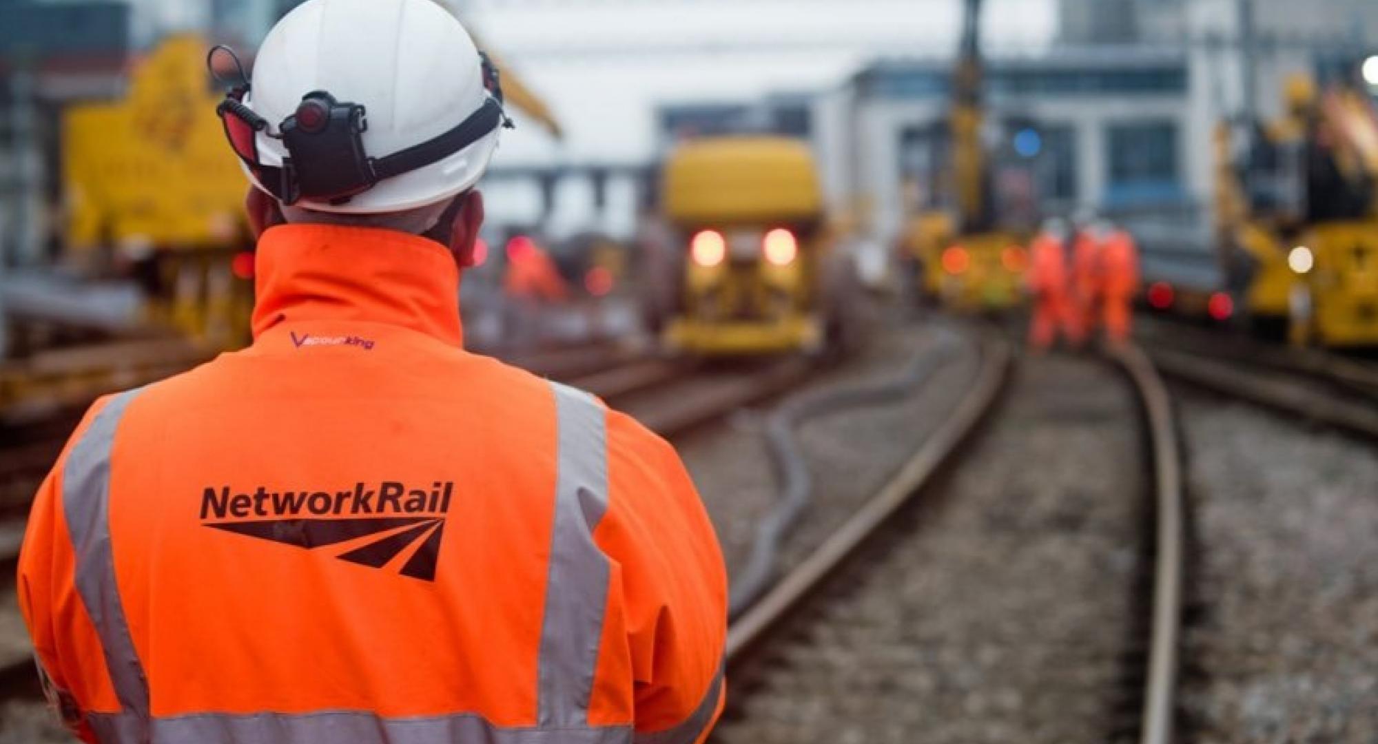 Network Rail Worker On Track