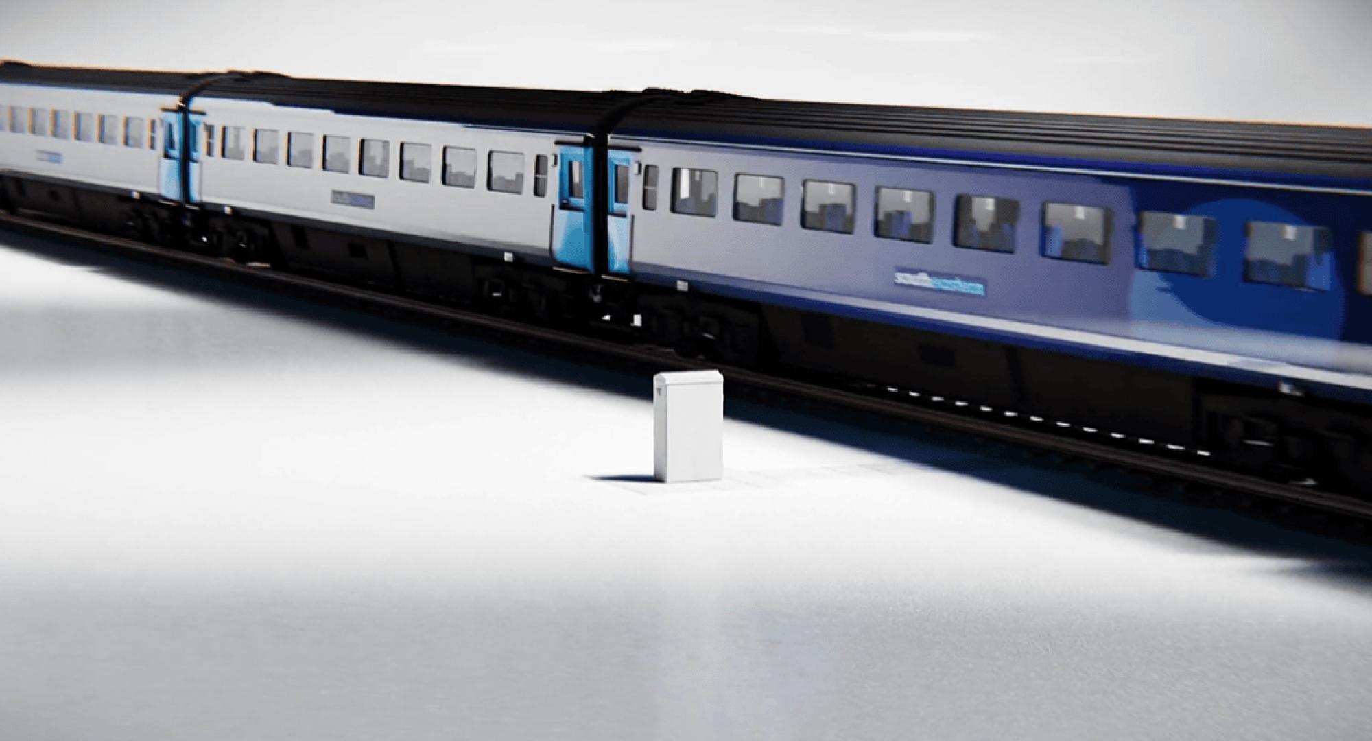 Image of signalling cabinet and train