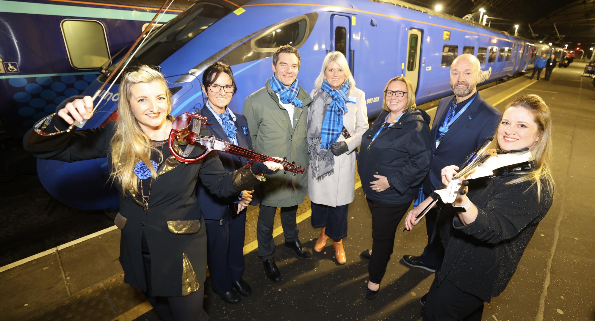 Team celebrating launch of new Lumo Service