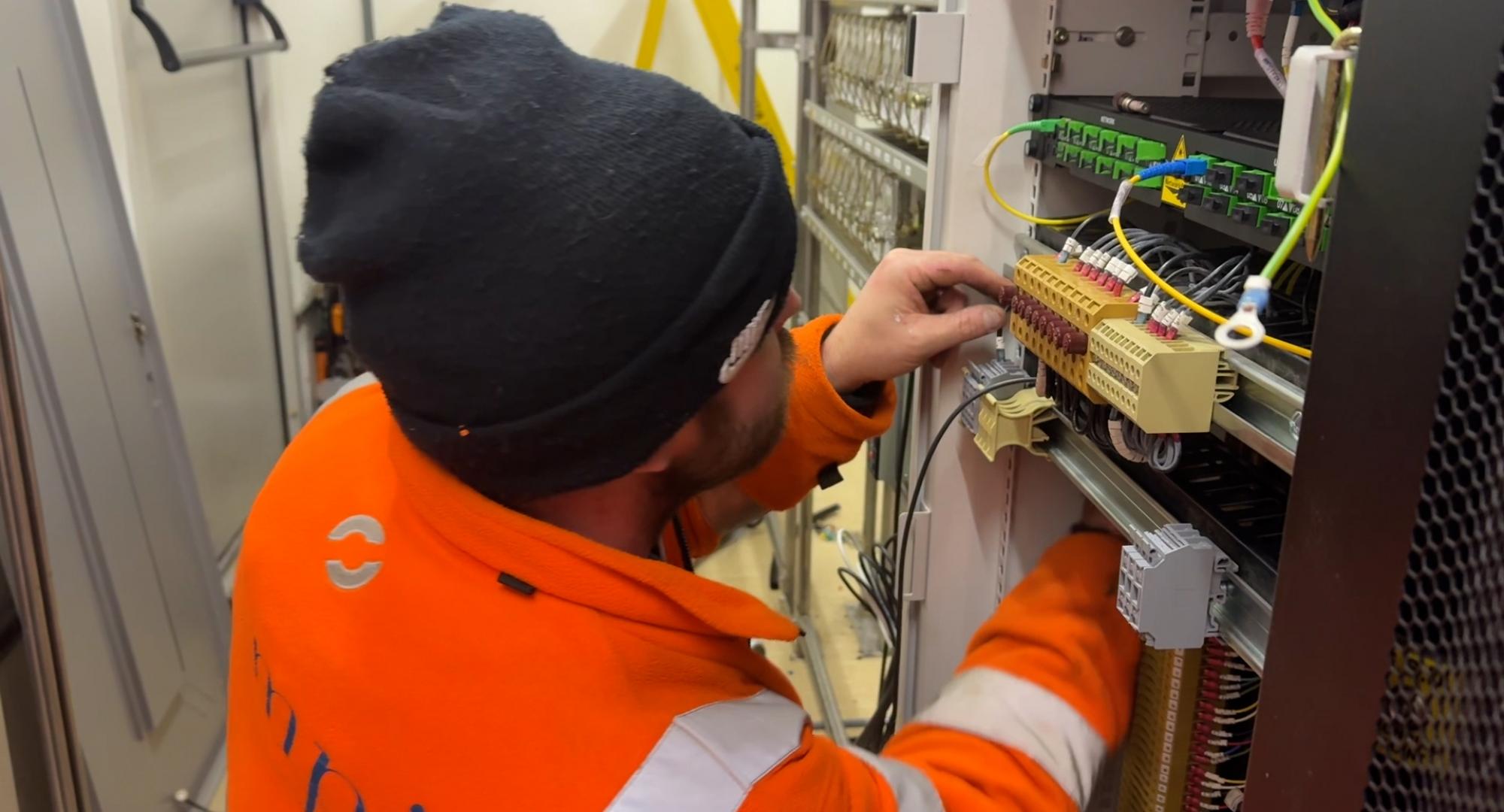 Engineering wiring up new signalling system