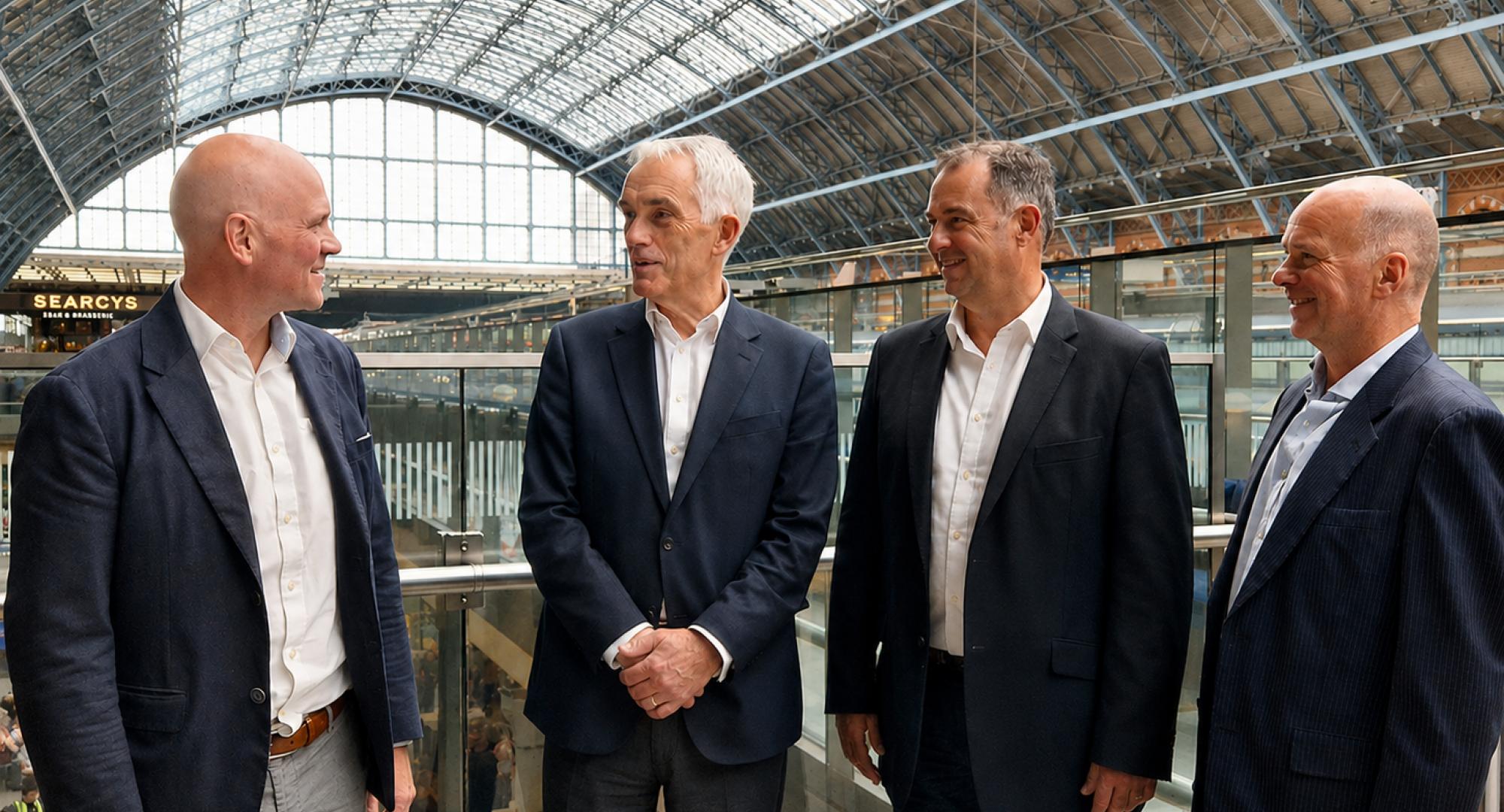 four men on gantry