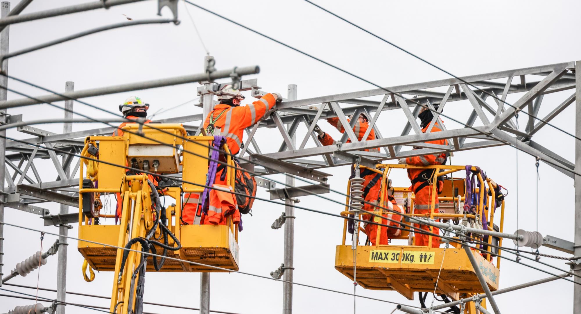 Overhead wires being installed
