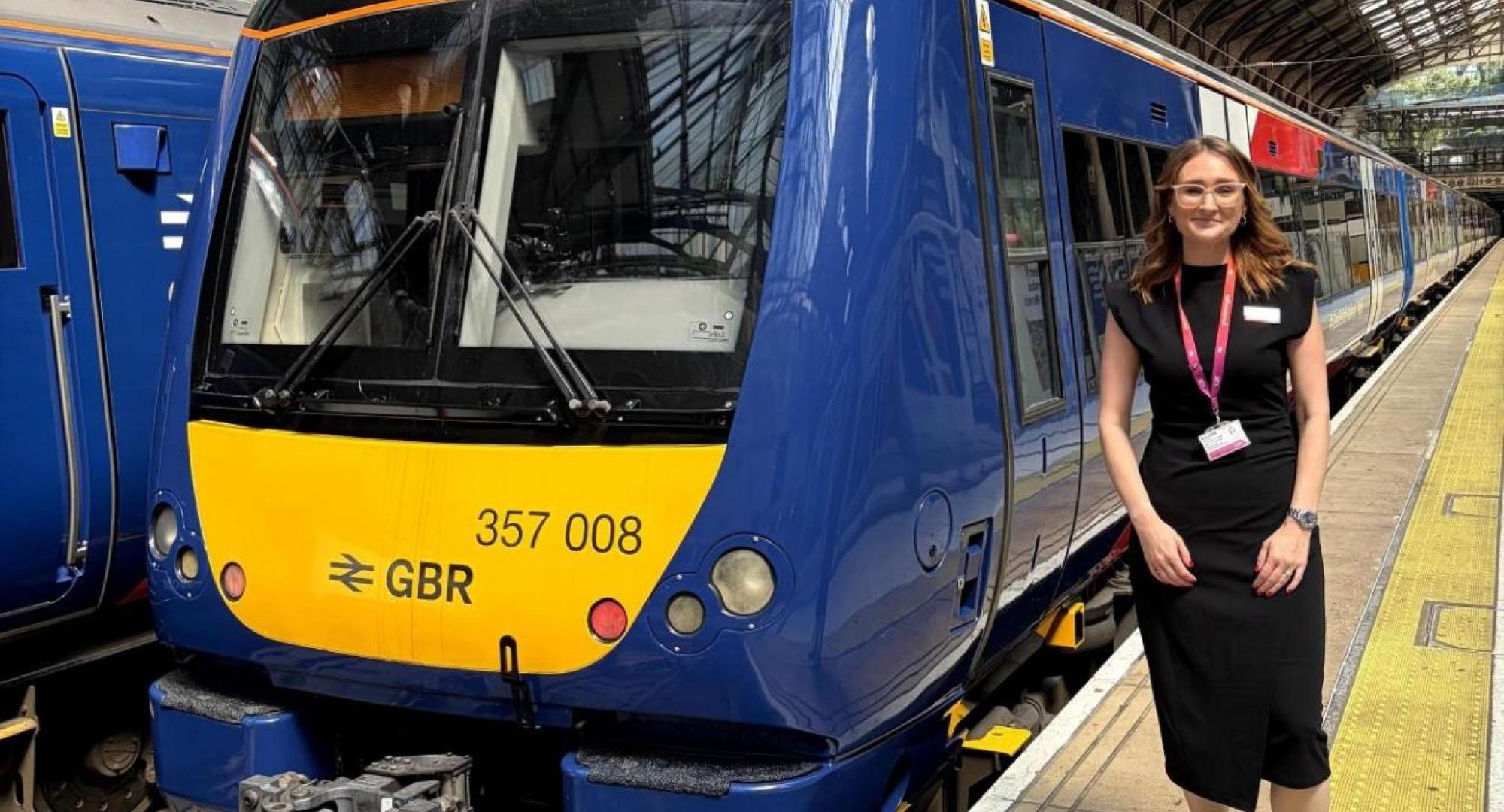 Alice Shimali and a train