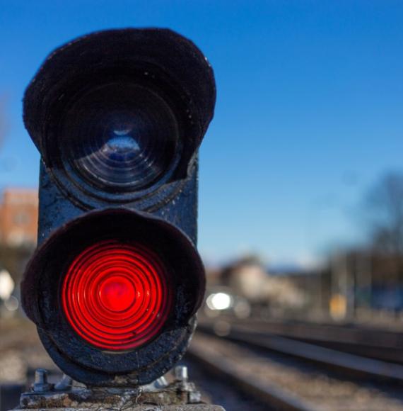 Railway red traffic light stop signal.