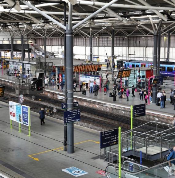 Passengers wait at Leeds Station in the UK