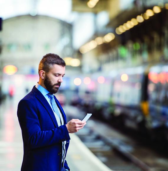 Passenger at a train station, as provided by Midlands Connect