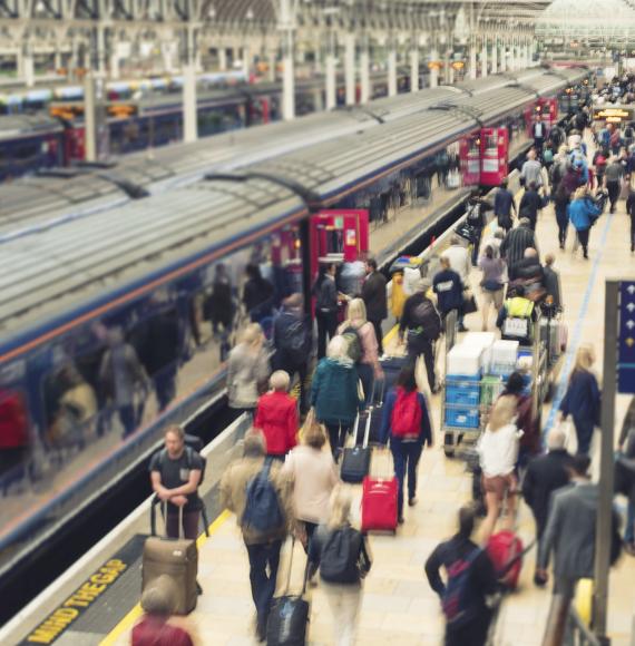 Passengers on a train station platform