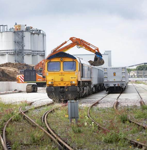 Freight train leaving HS2 Logistics Hub in Willesden