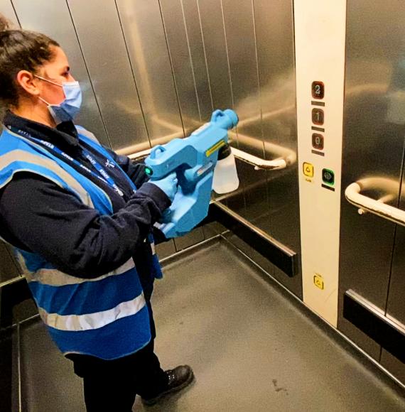 Cleaning a lift at London Euston Station