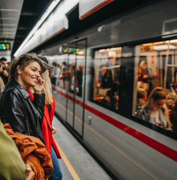 Passengers on a train station platform