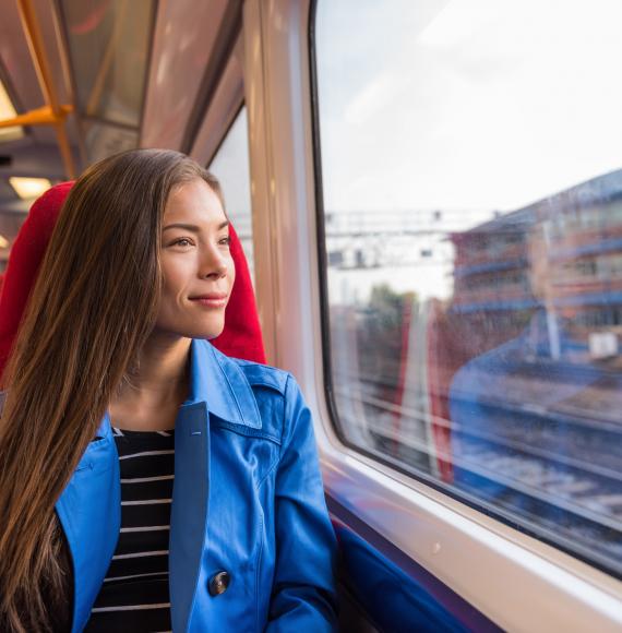 Female passenger riding on a train