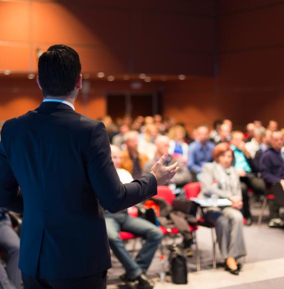 People attend business conference