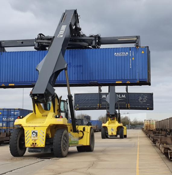 Freight being loaded on trains