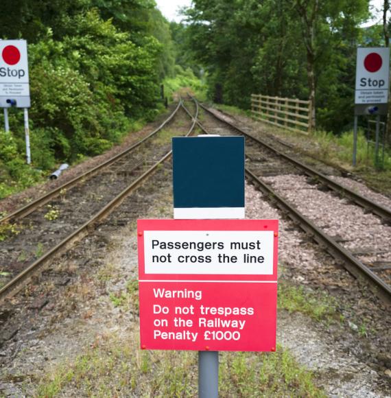 Passengers must not cross sign