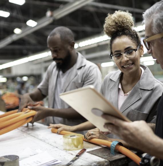 Young woman on a manufacturing apprenticeship