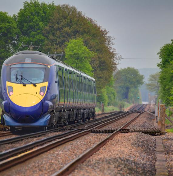 Train travels down tracks