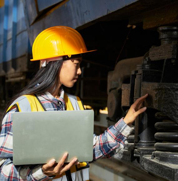 Female engineer working on train