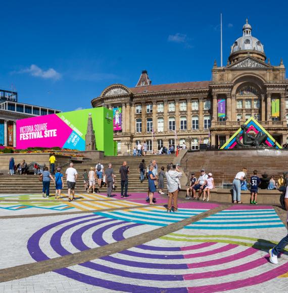 Birmingham, UK - August 8, 2022. A landscape view of The Commonwealth Games 2022 Festival Site in Victoria Square, Birmingham. Via Istock 