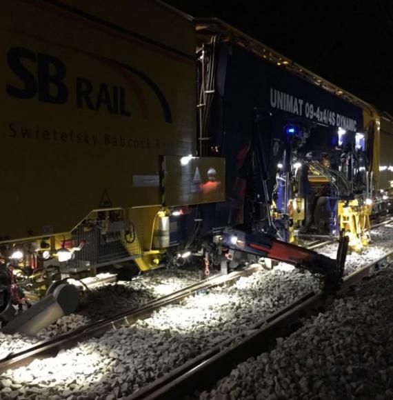 Tamping machine track levelling, via Network Rail 