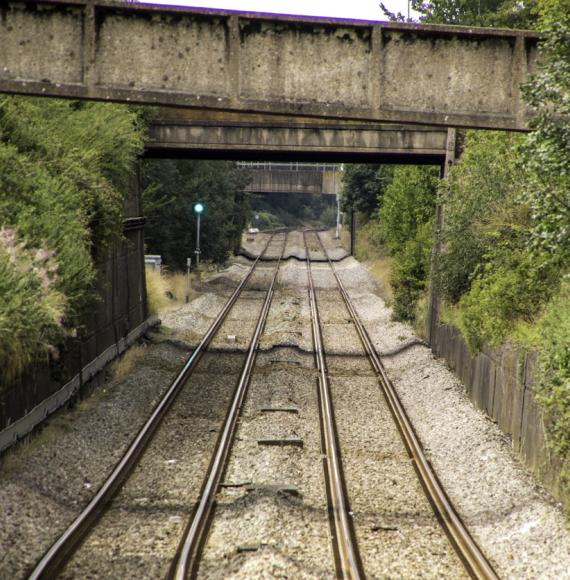 Dry rail track on a hot day, via Istock