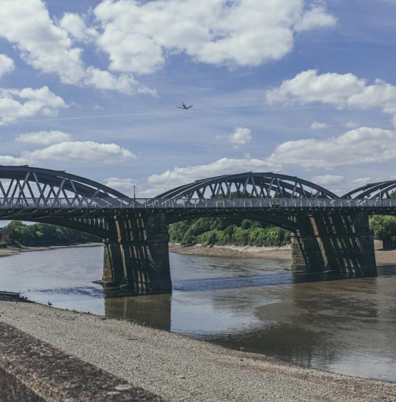 Barnes Railway Bridge located in the London Borough of Richmond upon Thames and the London Borough of Hounslow, via Istock 