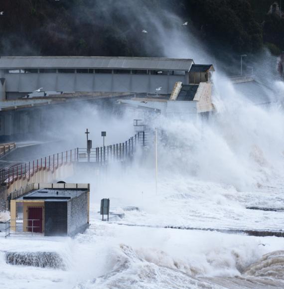 Damages to the rail lines in Dawlish due to extreme weather conditions, via Istock